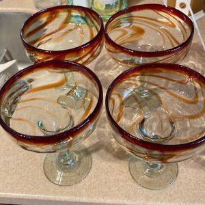 Margarita glasses hand blown set of. 4. Like new. Lovely orange swirl pattern